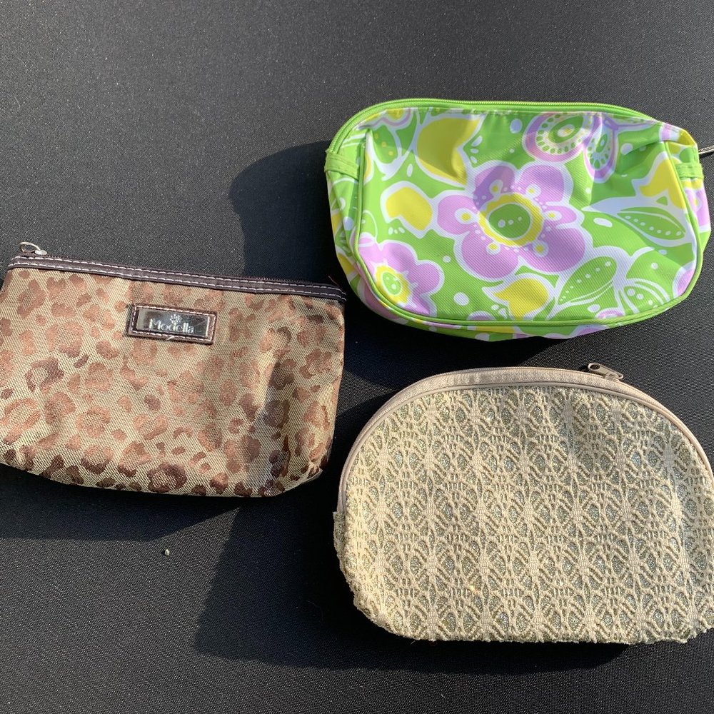 Never used, three make-up bags